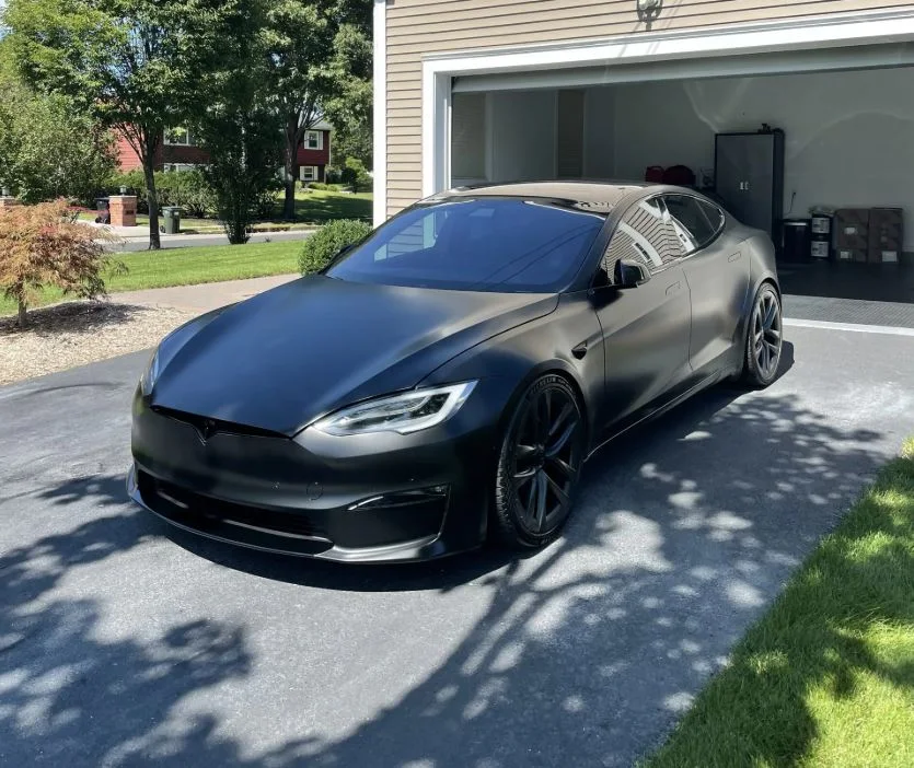 Tesla Model S parked outside a garage after the N2ITIVE alignment kit is set to factory specification